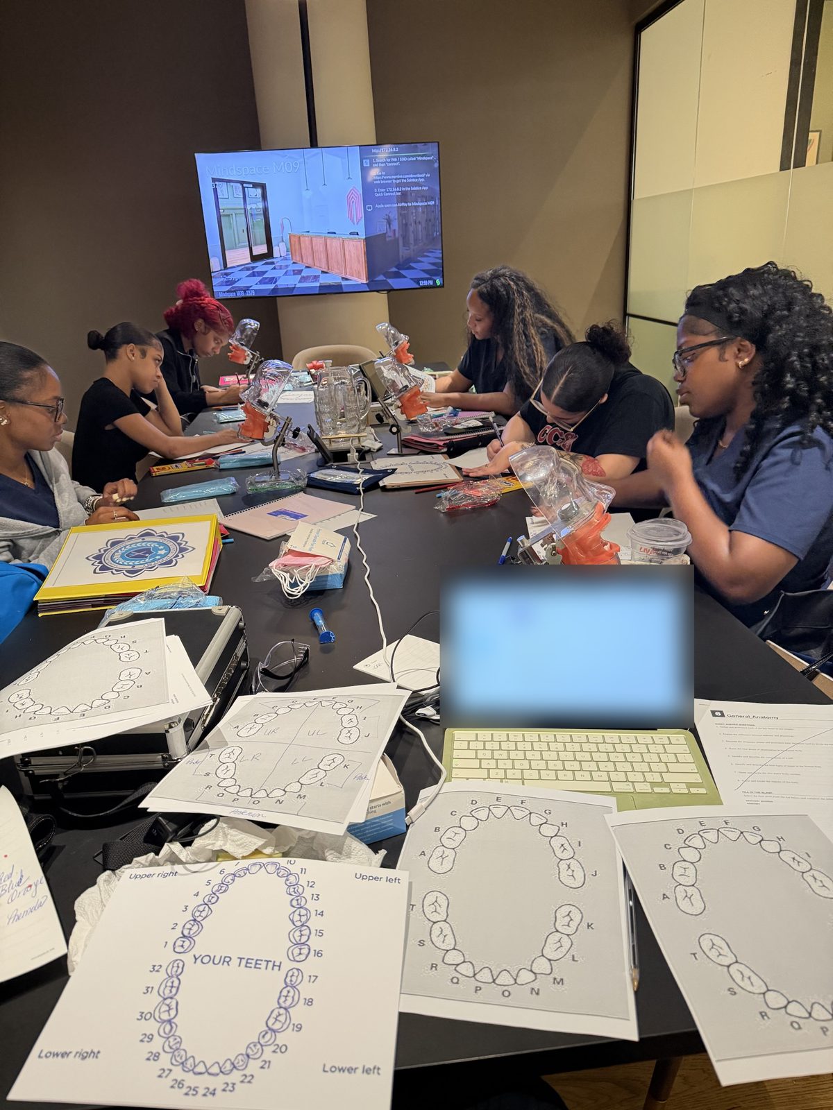 Dental assistant students charting teeth with typodonts at Coys Dental Academy
