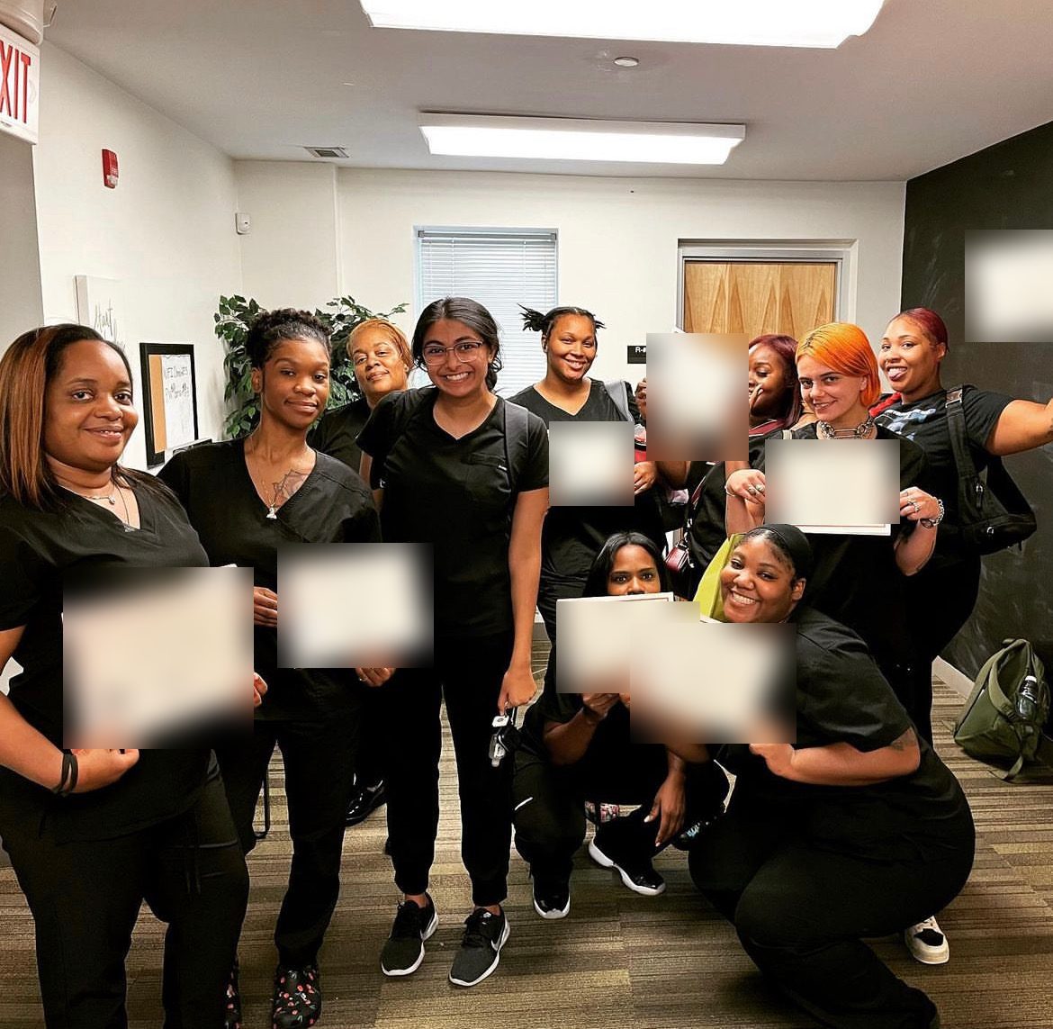 Phlebotomy program graduates holding their certificates